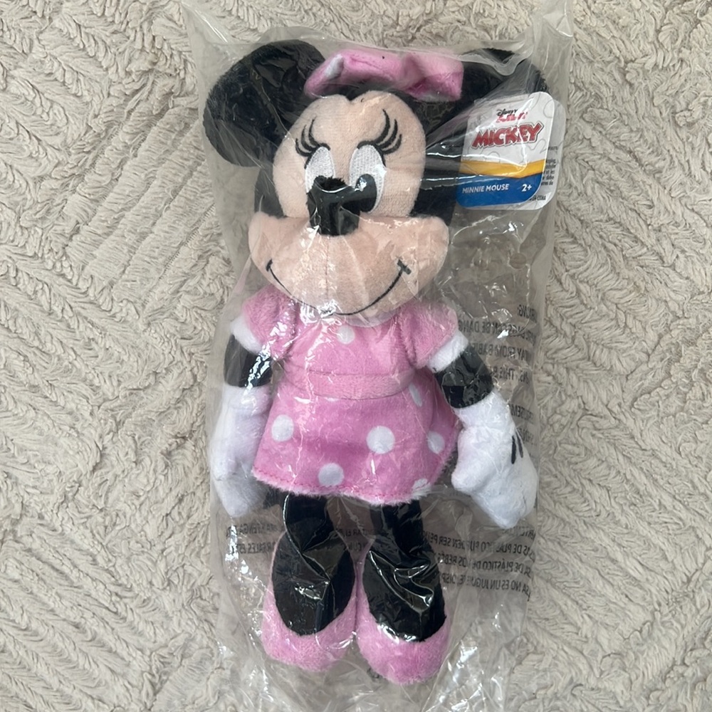 Minnie Mouse plush new in factory sealed packaging, approximately 10”